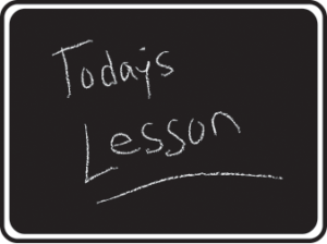 Chalkboard sign reading 'Today's Lesson'