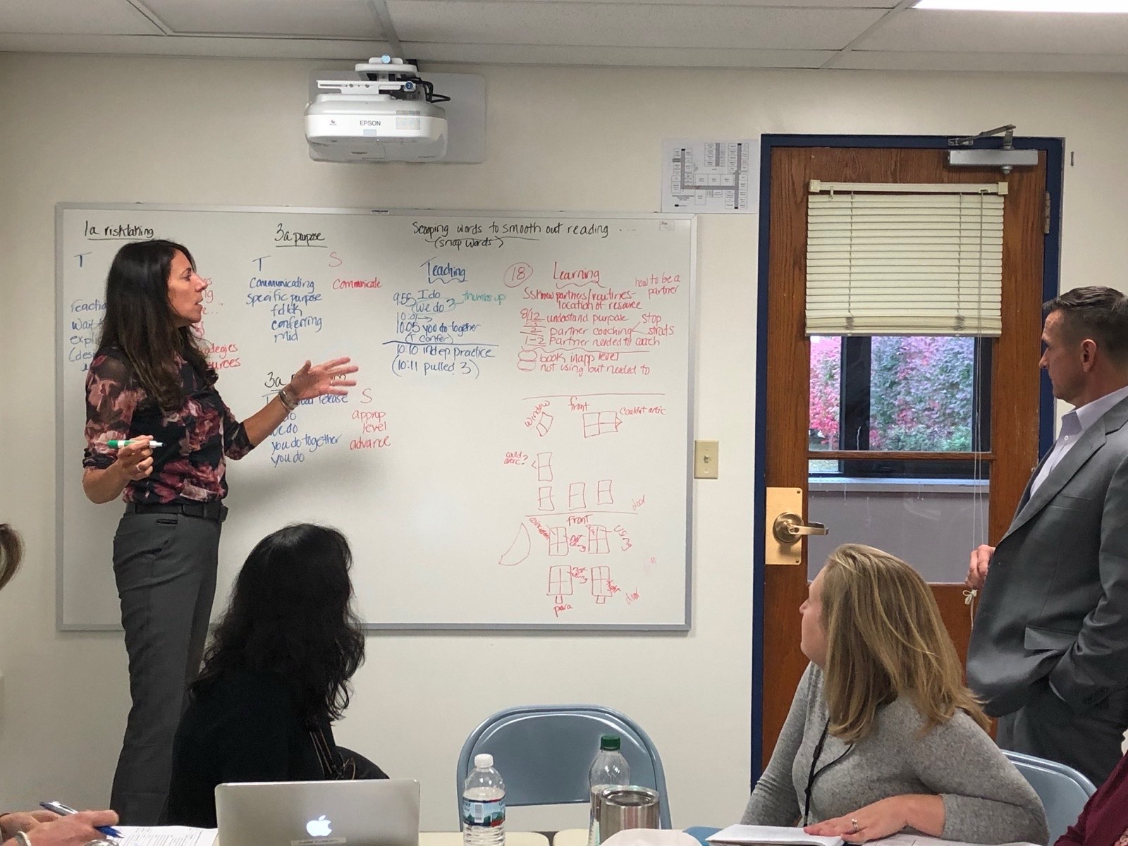 Amy facilitating an AI in K-12 leadership session